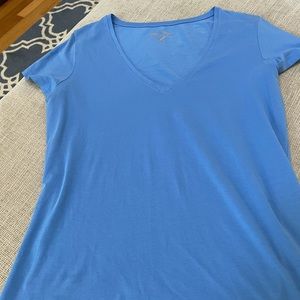 Cornflower blue, short sleeve shirt, stretchy material